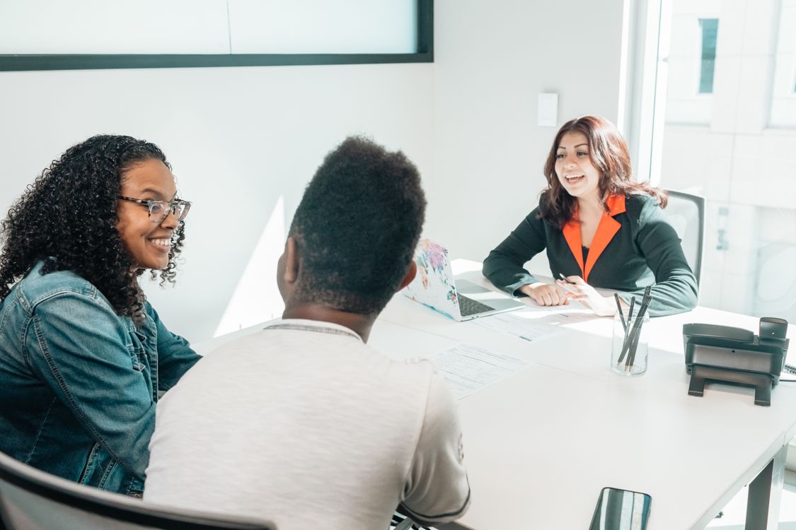 Stock photo of a couple in a supportive consultation